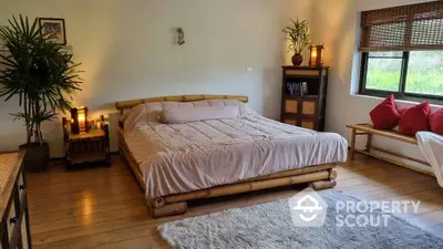 Cozy bedroom with bamboo bed and natural light