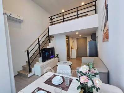 Modern duplex living room with stylish decor and open layout
