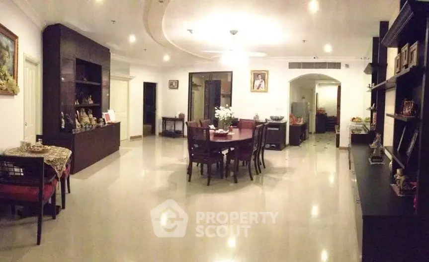 Spacious living room with elegant dining area and modern decor
