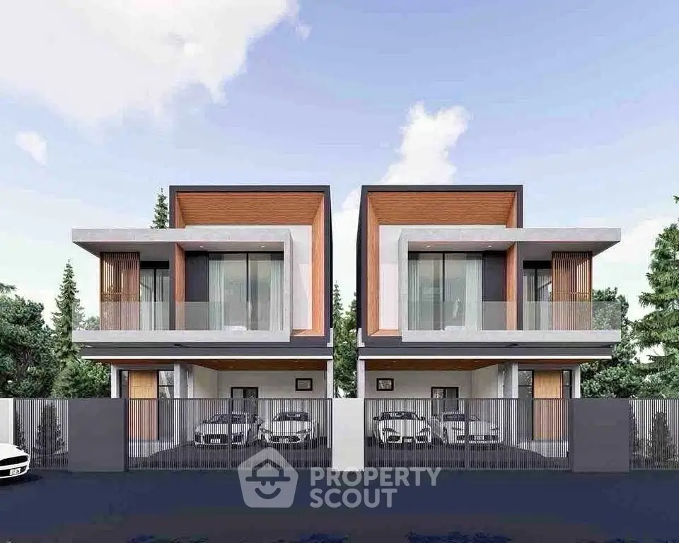 Modern twin houses with sleek design and spacious balconies in a serene neighborhood.