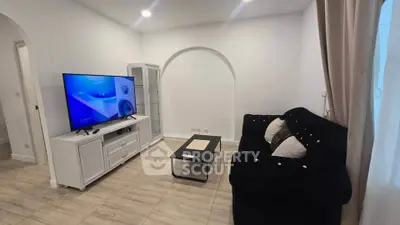 Cozy living room with modern TV setup and elegant decor