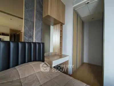 Modern bedroom with sleek design and built-in storage solutions