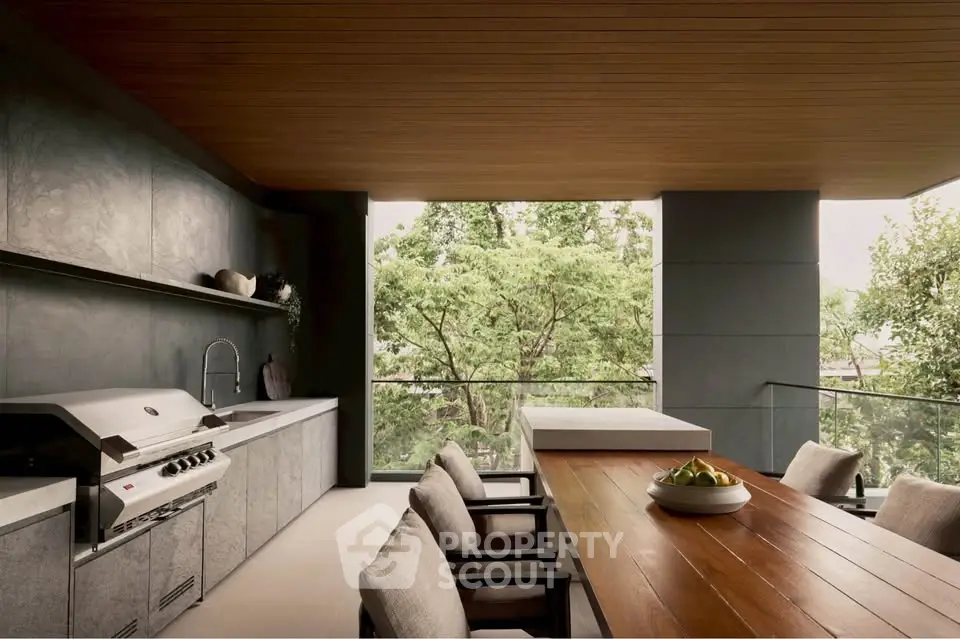 Luxurious outdoor kitchen with modern appliances and stunning garden view