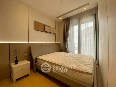 Modern bedroom with large window and stylish decor