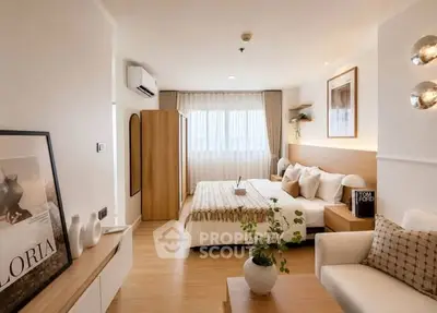 Stylish modern bedroom with cozy decor and natural light