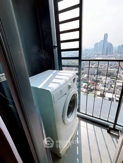 Compact balcony with washing machine and city view in modern apartment