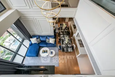 Luxurious modern living room with high ceiling and elegant decor