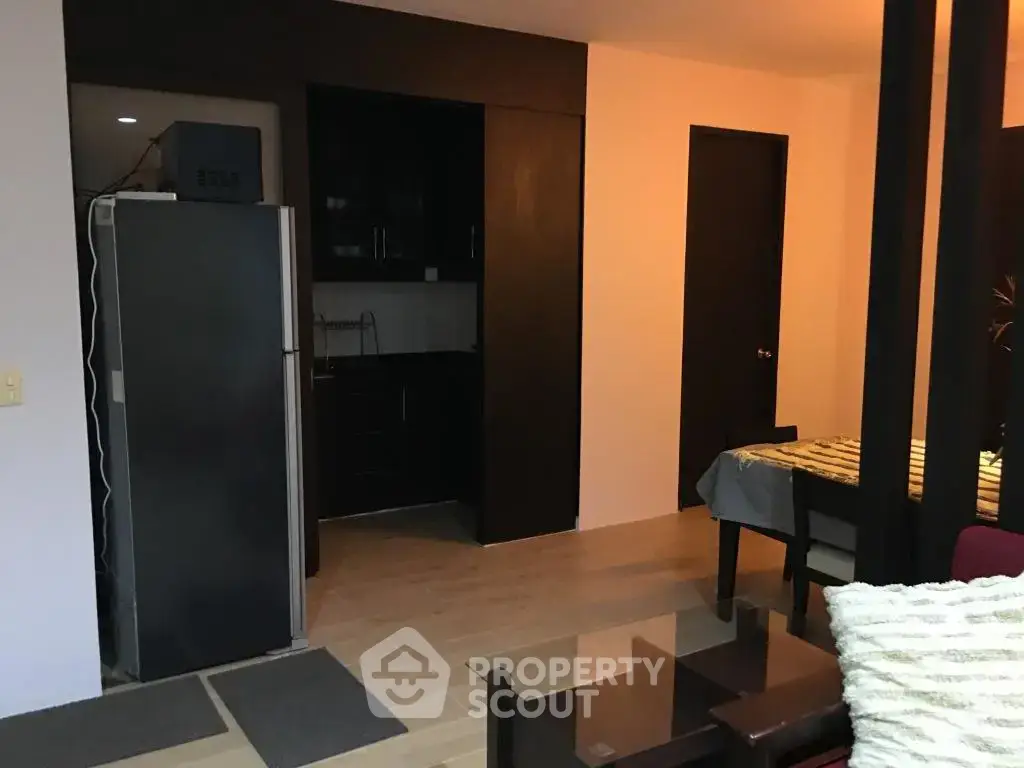 Cozy apartment interior with modern kitchen and dining area