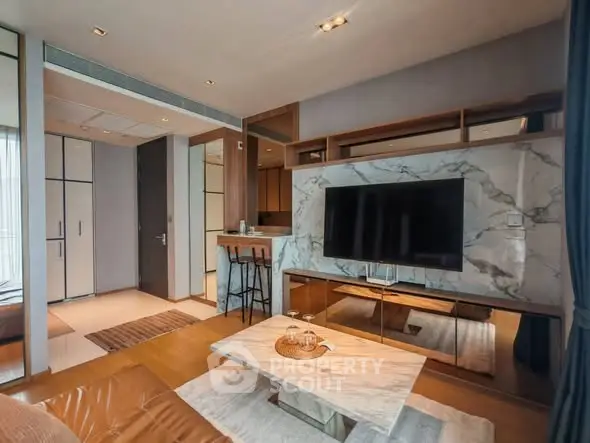 Luxurious modern living room with marble accents and sleek TV setup