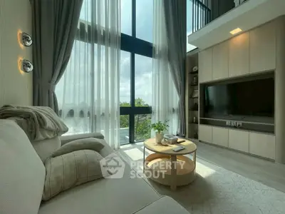 Luxurious modern living room with floor-to-ceiling windows and elegant decor