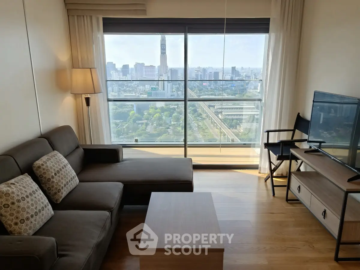 Modern living room with city view, stylish furniture, and natural light.