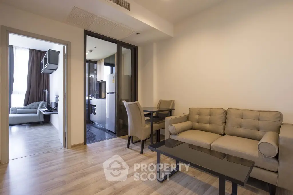 Modern living room with open layout and stylish furniture in a contemporary apartment.