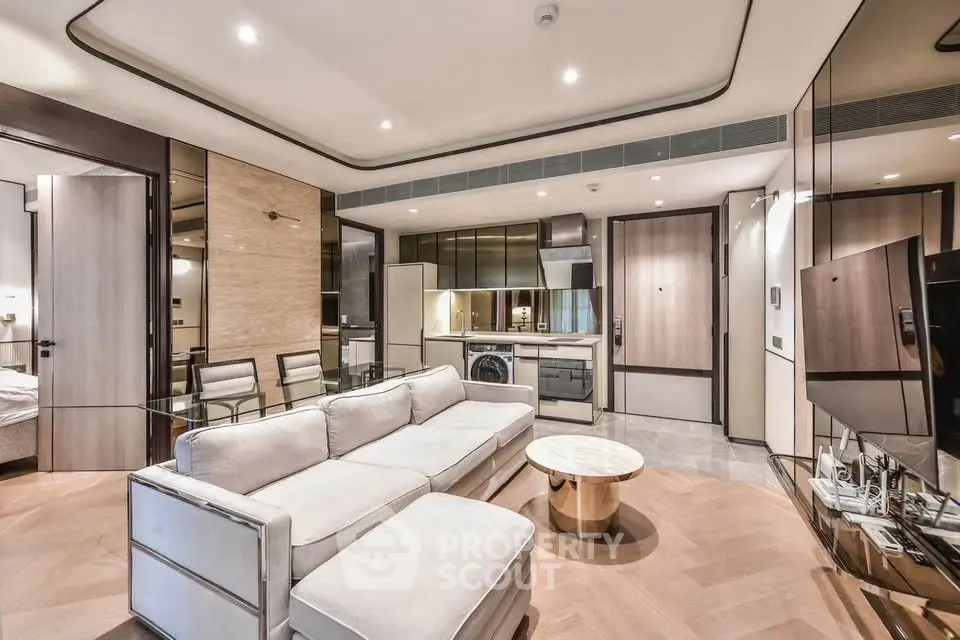 Luxurious modern living room with open kitchen and elegant furnishings