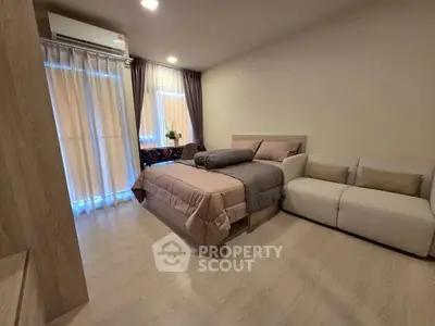 Cozy modern bedroom with stylish decor and natural light