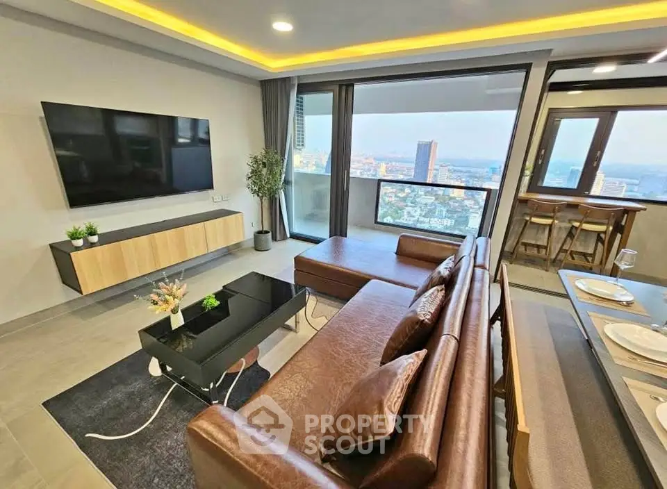 Modern living room with city view and stylish furniture