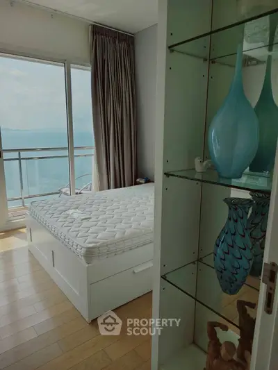 Stunning bedroom with ocean view and elegant decor