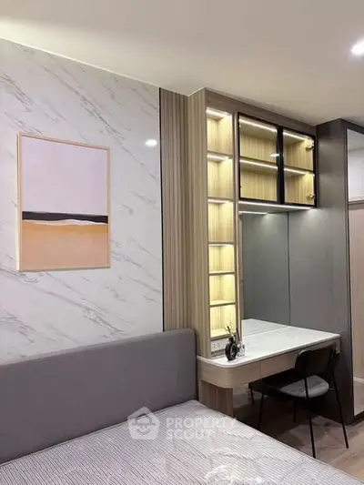 Modern bedroom with stylish decor and built-in vanity desk