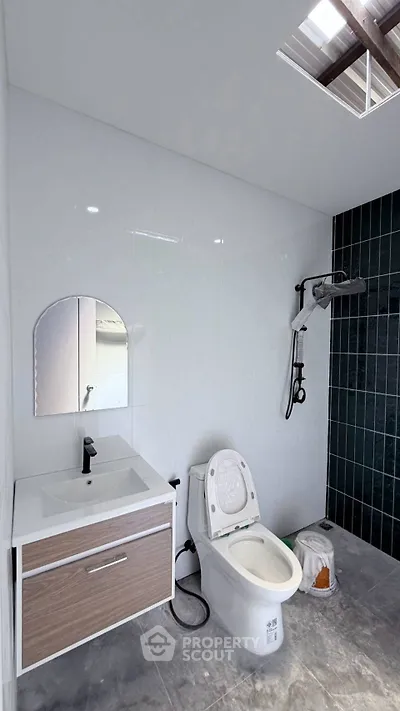 Modern bathroom with sleek fixtures and stylish shower area
