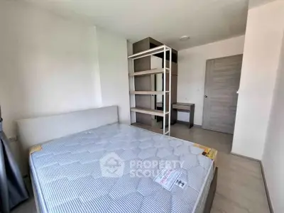 Modern bedroom with minimalist design and stylish shelving unit