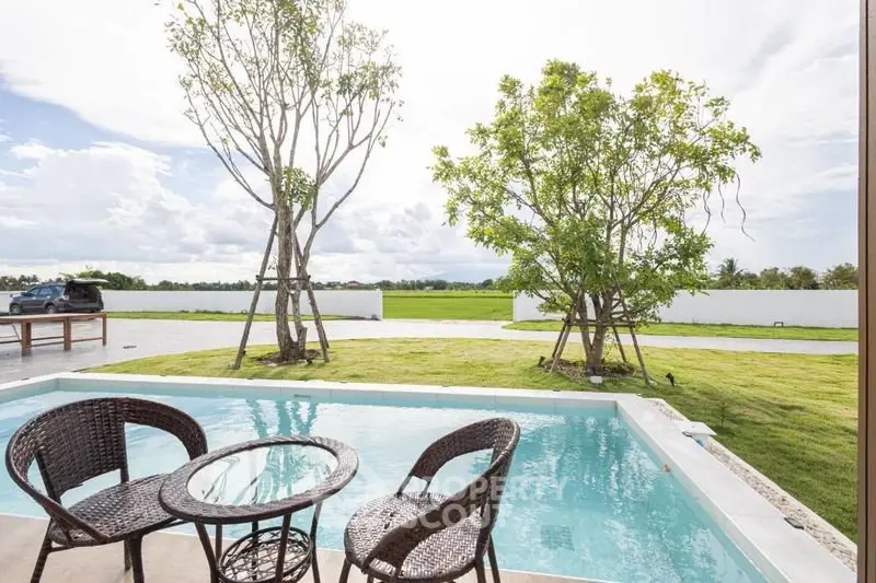 Luxurious outdoor pool area with scenic views and stylish seating, perfect for relaxation and entertainment.