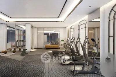 Luxurious modern gym with state-of-the-art equipment and elegant design in upscale residential building.