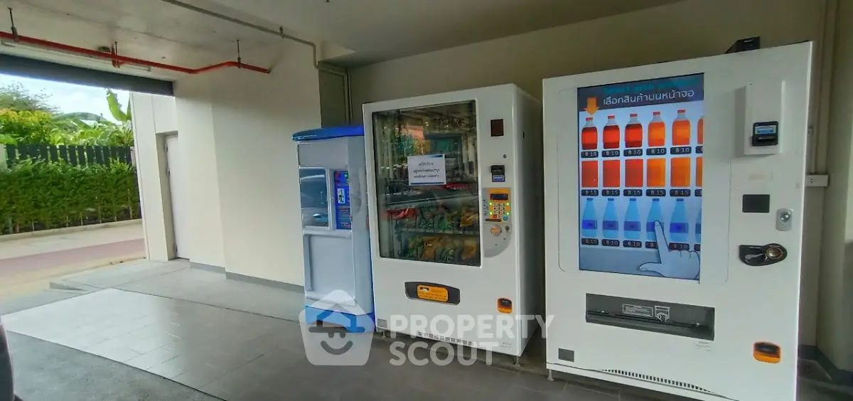 Modern vending machines in a residential building's common area
