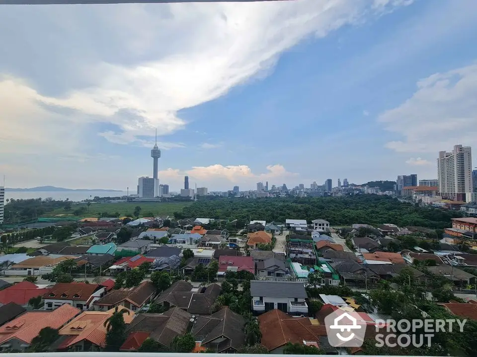 Stunning cityscape view with lush greenery and skyline in the background