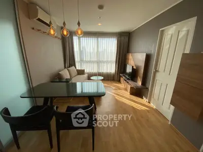 Modern living room with stylish furniture and natural light