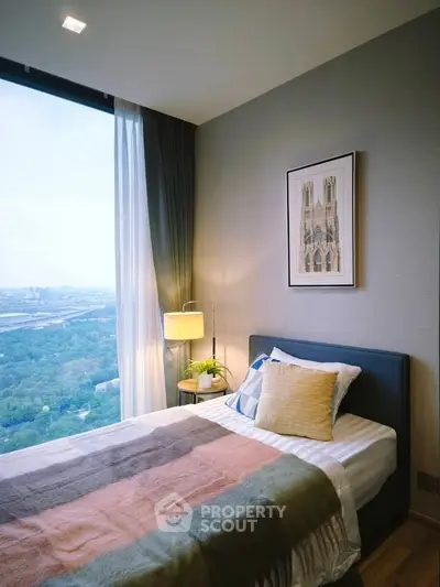 Chic bedroom with stunning city view and modern decor