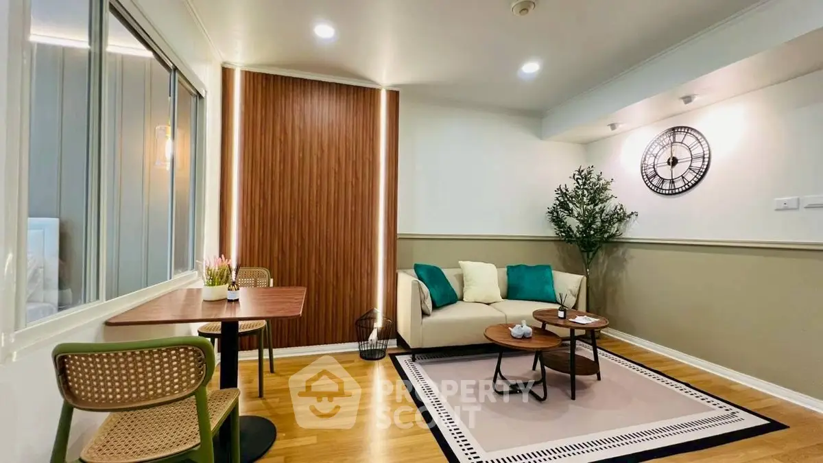 Chic modern living room with stylish decor and cozy seating area, perfect for relaxation and entertaining.