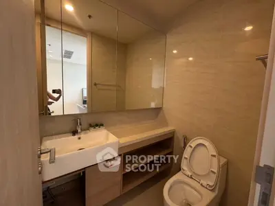 Modern bathroom with sleek design and ample storage space