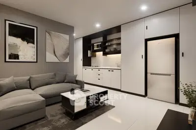 Modern living room with integrated kitchen, sleek design, and stylish decor.