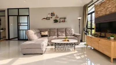 Spacious modern living room with cozy sectional sofa and stylish decor