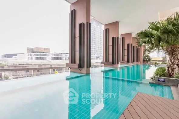 Luxurious rooftop infinity pool with stunning city views and modern architecture.