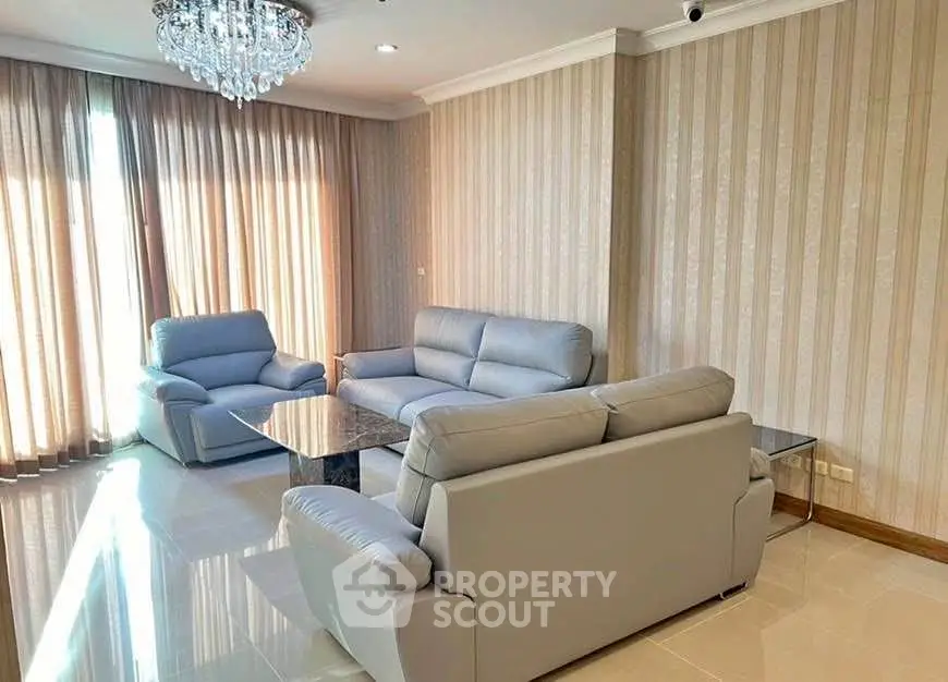 Elegant living room with modern furniture and natural light