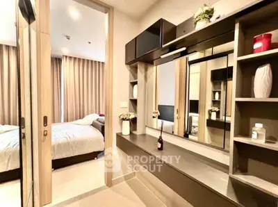 Modern bedroom with stylish decor and ample storage space