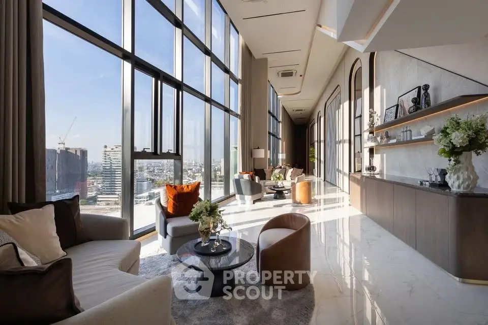 Luxurious high-rise living room with panoramic city views and elegant decor