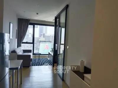 Modern apartment interior with city view, featuring a cozy living room and sleek design.