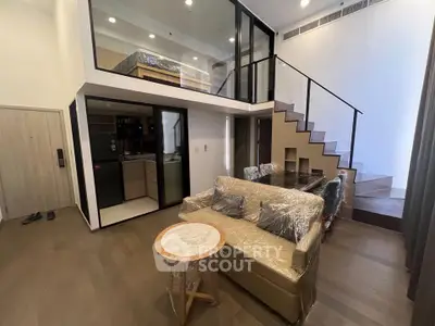 Modern duplex apartment with stylish mezzanine and cozy living area