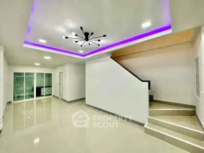 Modern interior with sleek staircase and ambient lighting