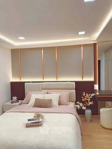Luxurious modern bedroom with elegant lighting and stylish decor