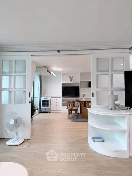 Spacious living room with sliding doors and modern decor
