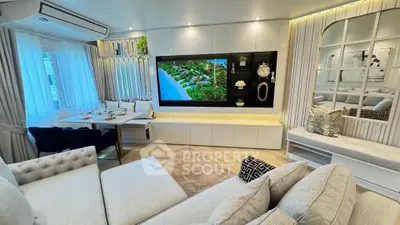 Luxurious modern living room with elegant decor and spacious seating area, perfect for relaxation and entertainment.