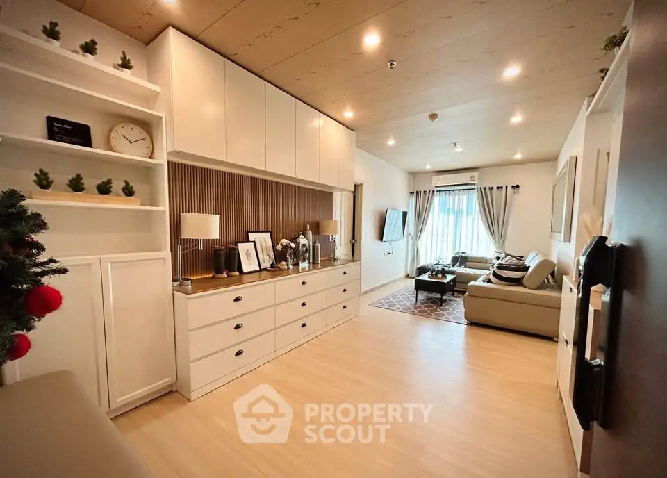 Spacious modern living room with elegant decor and ample natural light
