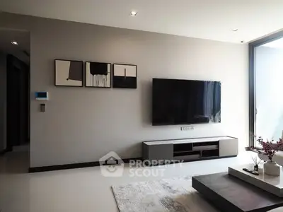 Modern living room with sleek TV setup and stylish decor
