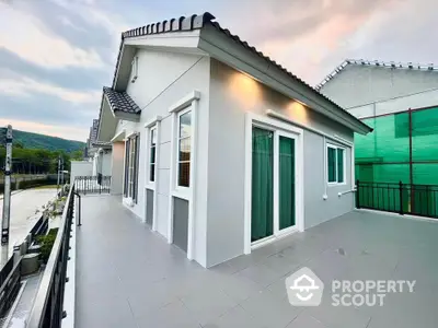 Modern single-story house with spacious terrace and mountain view