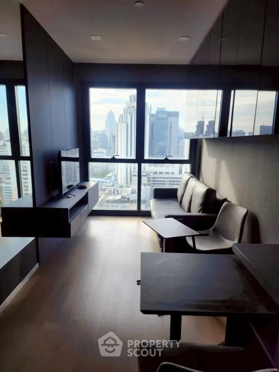 Modern living room with stunning city view and sleek furniture