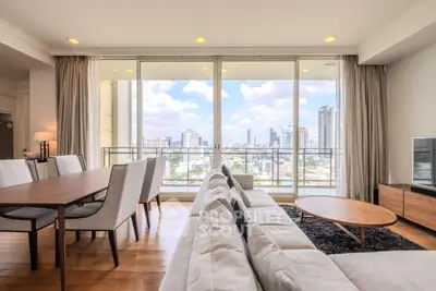 Spacious living room with stunning city view and modern furniture
