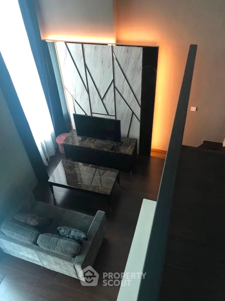 Luxurious living room with modern design and high ceiling view