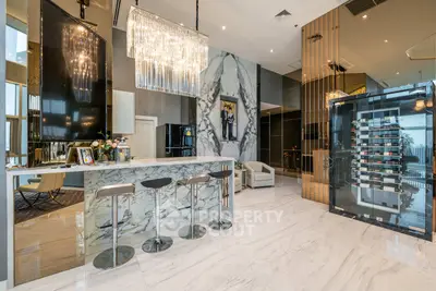 Luxurious modern living room with marble floors and elegant chandelier